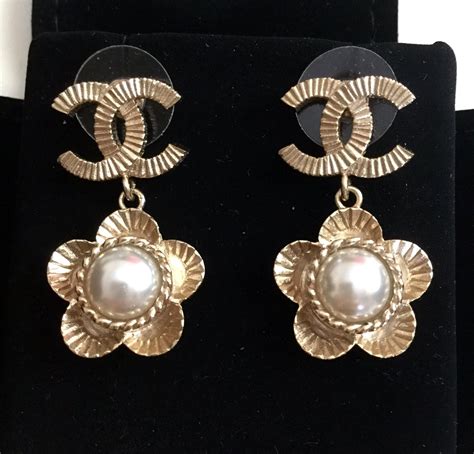 chanel big pearl earrings|Chanel cc earrings real.